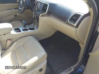 2014 Jeep Grand Cherokee Limited with VIN 1C4RJEBGXEC389361, listed as a IAAI auction lot 41772366 with 122,473 mi miles. Bid and sale history available at carsss.com. Image 5.