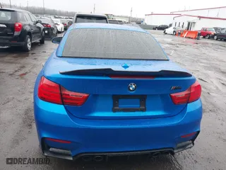 2015 BMW M4 with VIN WBS3U9C5XFJ968082, listed as a IAAI auction lot 41513593 with 57,715 mi miles. Bid and sale history available at carsss.com. Image 6.