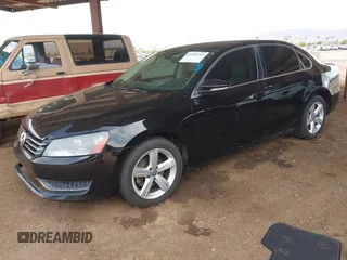 2012 Volkswagen Passat SE w/Sunroof with VIN 1VWBP7A3XCC020584, listed as a IAAI auction lot 41905793 with 138,642 mi miles. Bid and sale history available at carsss.com. Image 2.