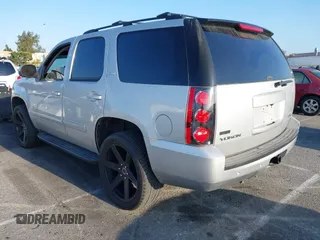 2010 GMC Yukon SLT with VIN 1GKUCCE00AR255901, listed as a IAAI auction lot 42149960 with 196,014 mi miles. Bid and sale history available at carsss.com. Image 3.