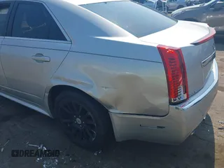 2012 Cadillac CTS with VIN 1G6DC5E51C0156873, listed as a IAAI auction lot 42587421 with 169,006 mi miles and . Bid and sale history available at DreamBid. Image 6.