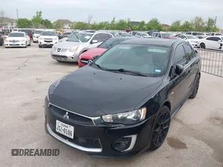 2016 Mitsubishi Lancer GT with VIN JA32U8FW8GU011501, listed as a IAAI auction lot 41779016 with 153,082 mi miles. Bid and sale history available at carsss.com. Image 2.