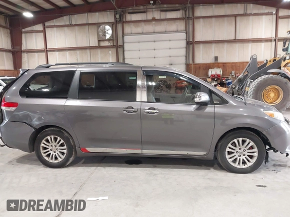 2011 Toyota Sienna XLE AAS with VIN 5TDYK3DC0BS063232, listed as a IAAI auction lot 42433187 with 198,252 mi miles and . Bid and sale history available at DreamBid. Image 13.
