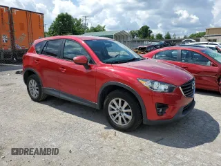 2016 Mazda CX-5 Touring with VIN JM3KE2CY0G0627886, listed as a Copart auction lot 55207054 with 95,884 mi miles and Salvage Title. Bid and sale history available at carsss.com. Image 4.