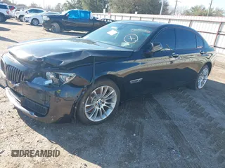 2015 BMW 7 Series 750Li xDrive with VIN WBAYF8C59FD655120, listed as a IAAI auction lot 41315152 with 82,244 mi miles and . Bid and sale history available at carsss.com. Image 2.