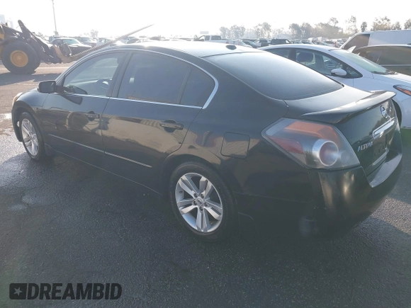 2010 Nissan Altima 3.5 SR with VIN 1N4BL2AP2AN527586, listed as a IAAI auction lot 41454445 with 184,955 mi miles. Bid and sale history available at carsss.com. Image 3.