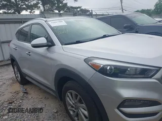 2017 Hyundai Tucson SE with VIN KM8J3CA44HU585714, listed as a IAAI auction lot 42097980 with 96,483 mi miles. Bid and sale history available at carsss.com. Image 13.