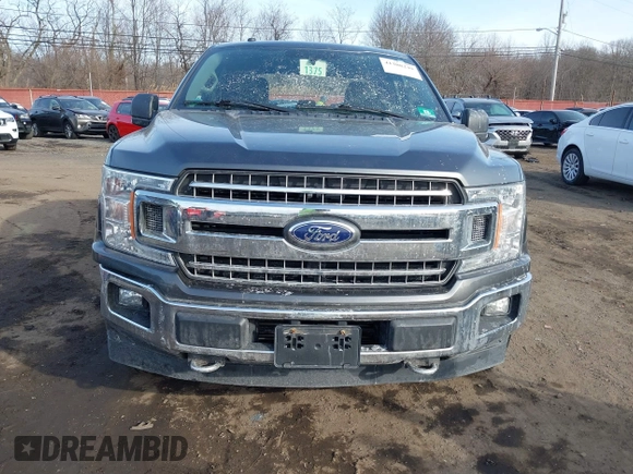 2018 Ford F-150 XL with VIN 1FTEX1EP7JFA75693, listed as a IAAI auction lot 41308249 with 75,747 mi miles and . Bid and sale history available at DreamBid. Image 12.