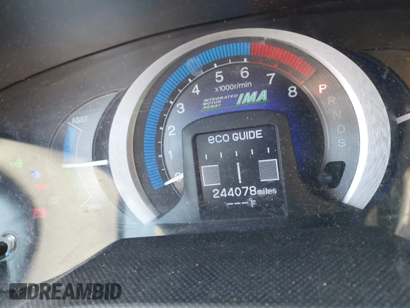 2011 Honda Insight EX with VIN JHMZE2H7XBS006254, listed as a IAAI auction lot 42222213 with 244,078 mi miles and . Bid and sale history available at DreamBid. Image 7.