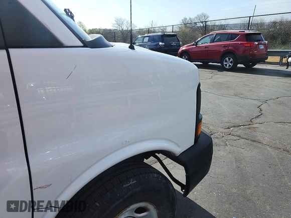 2012 Chevrolet Express Cargo Van with VIN 1GCWGFCA0C1174842, listed as a IAAI auction lot 42141778 with 266,894 mi miles. Bid and sale history available at carsss.com. Image 1.