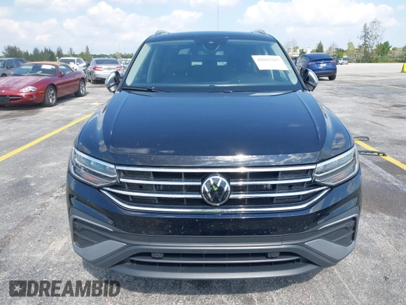 2024 Volkswagen Tiguan with VIN 3VVTB7AX6RM218502, listed as a IAAI auction lot 42063327 with 7,280 mi miles and . Bid and sale history available at DreamBid. Image 13.