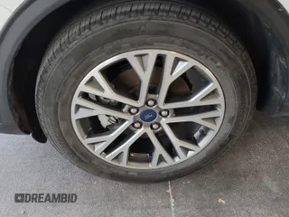 2021 Ford Escape SEL Hybrid with VIN 1FMCU9CZ1MUB25597, listed as a IAAI auction lot 42663573 with 79,061 mi miles and . Bid and sale history available at DreamBid. Image 51.