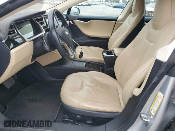2014 Tesla Model S 60 with VIN 5YJSA1H14EFP34335, listed as a Copart auction lot 65504325 with Not provided miles and Clean title. Bid and sale history available at DreamBid. Image 7.