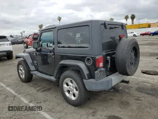 2015 Jeep Wrangler Sahara z VIN 1C4AJWBG2FL614702, wystawiony jako Copart lot #53516315 z przebiegiem 91 899 mil mil oraz Szkoda całkowita • Salvage title. Historia ofert i sprzedaży dostępna na DreamBid. Obrazek 2.