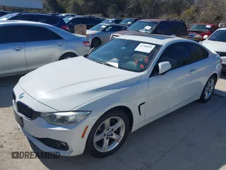 2014 BMW 4 Series 428i xDrive with VIN WBA3N9C58EF721369, listed as a IAAI auction lot 41768891 with 181,068 mi miles and . Bid and sale history available at DreamBid. Image 20.