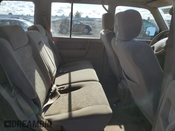 2001 Isuzu Trooper S with VIN JACDJ58XX17J02121, listed as a Copart auction lot 77664704 with 148,752 mi miles and Salvage title. Bid and sale history available at DreamBid. Image 10.