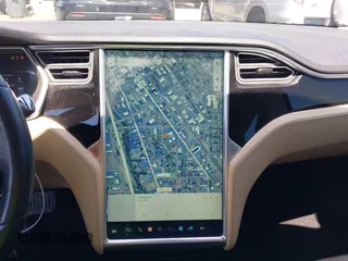 2014 Tesla Model S 60 with VIN 5YJSA1H18EFP31969, listed as a IAAI auction lot 42312485 with 90,043 mi miles and . Bid and sale history available at DreamBid. Image 19.