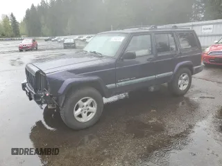1999 Jeep Cherokee Sport with VIN 1J4FF68S6XL602177, listed as a Copart auction lot 51962355 with 176,386 mi miles and Salvage Title. Bid and sale history available at carsss.com. Image 1.