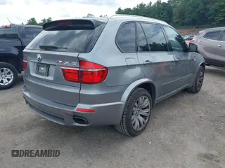 2013 BMW X5 xDrive50i with VIN 5UXZV8C52D0C15272, listed as a IAAI auction lot 42644739 with 169,393 mi miles and . Bid and sale history available at DreamBid. Image 4.