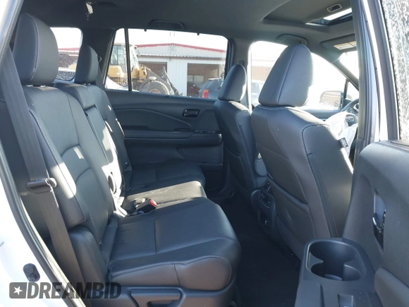 2023 Honda Passport Elite with VIN 5FNYF8H05PB005081, listed as a IAAI auction lot 41698186 with 31,853 mi miles and . Bid and sale history available at DreamBid. Image 8.