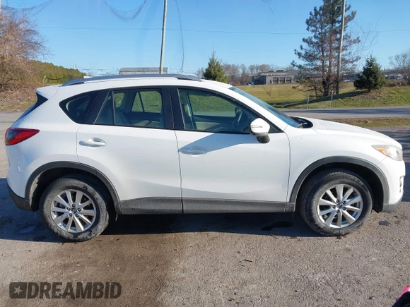 2016 Mazda CX-5 Sport with VIN JM3KE4BY8G0605504, listed as a IAAI auction lot 41866173 with 91,797 mi miles. Bid and sale history available at carsss.com. Image 14.