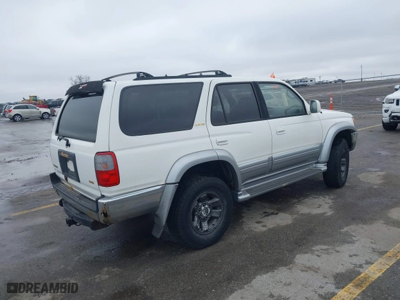 1998 Toyota 4Runner Limited with VIN JT3HN87RXW0148418, listed as a IAAI auction lot 41708975 with 305,530 mi miles. Bid and sale history available at carsss.com. Image 4.