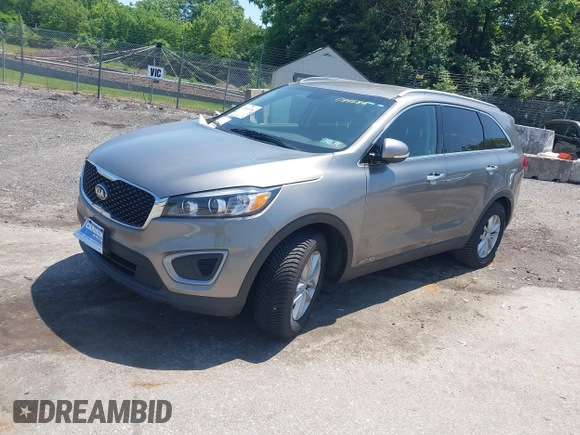 2016 Kia Sorento LX with VIN 5XYPGDA52GG044582, listed as a IAAI auction lot 42402596 with 143,250 mi miles and . Bid and sale history available at DreamBid. Image 17.