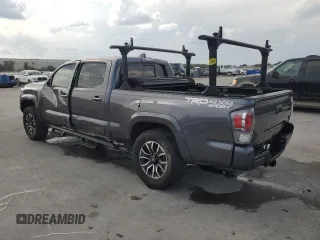 2020 Toyota Tacoma SR5 z VIN 3TYDZ5BN9LT000209, wystawiony jako Copart lot #56127875 z przebiegiem 92 350 mil mil oraz Szkoda całkowita • Salvage title. Historia ofert i sprzedaży dostępna na DreamBid. Obrazek 2.