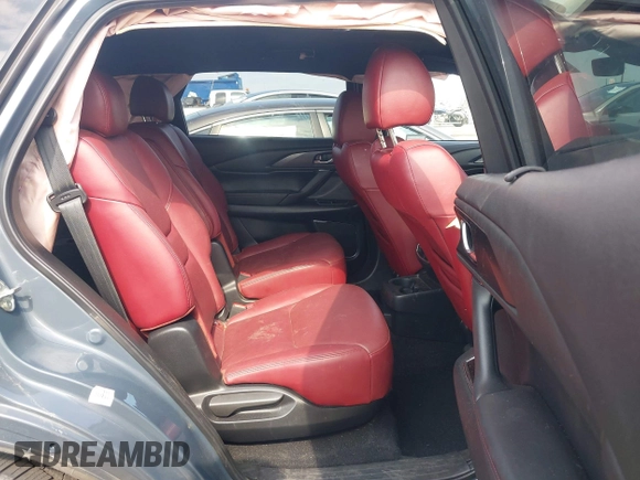 2021 Mazda CX-9 Carbon Edition z VIN JM3TCBDY0M0526352, wystawiony jako IAAI lot #42403901 z przebiegiem 50 193 mil mil oraz . Historia ofert i sprzedaży dostępna na DreamBid. Obrazek 8.