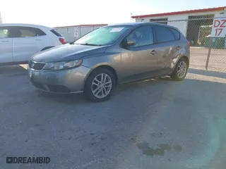 2011 Kia Forte 5-Door EX with VIN KNAFU5A2XB5417673, listed as a IAAI auction lot 41825573 with 129,811 mi miles. Bid and sale history available at carsss.com. Image 2.