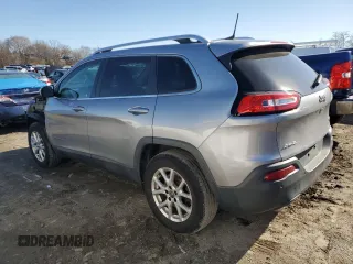 2016 Jeep Cherokee Latitude with VIN 1C4PJMCS1GW310942, listed as a Copart auction lot 48209315 with 153,448 mi miles and Salvage Title. Bid and sale history available at carsss.com. Image 2.