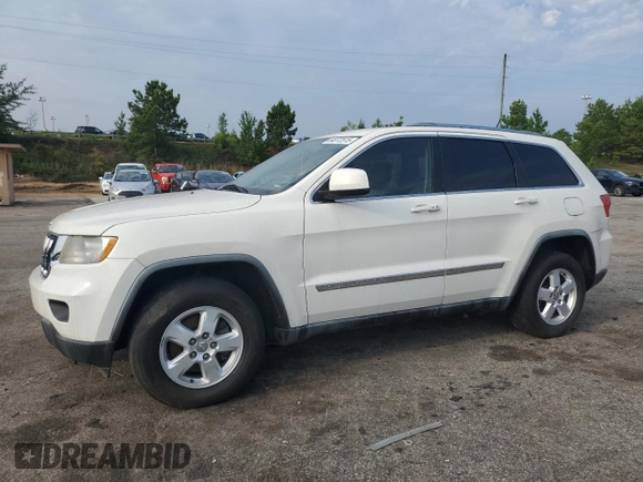 2011 Jeep Grand Cherokee Laredo with VIN 1J4RR4GG2BC581987, listed as a Copart auction lot 64072515 with 213,607 mi miles and Clean title. Bid and sale history available at DreamBid. Image 1.