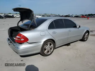 2004 Mercedes-Benz E-Class 5.0L with VIN WDBUF70J84A492244, listed as a Copart auction lot 61143664 with 165,750 mi miles and Salvage Title. Bid and sale history available at carsss.com. Image 3.