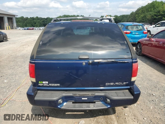 2000 Chevrolet Blazer LS with VIN 1GNCT18W3YK104430, listed as a Copart auction lot 68858864 with 47,342 mi miles and Salvage title. Bid and sale history available at DreamBid. Image 6.