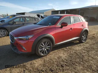 2018 Mazda CX-3 Grand Touring z VIN JM1DKFD79J0313779, wystawiony jako Copart lot #49120125 z przebiegiem 40 703 mil mil oraz Szkody całkowita. Historia ofert i sprzedaży dostępna na DreamBid. Obrazek 1.