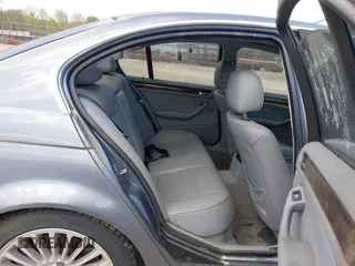 2001 BMW 3 Series 330i with VIN WBAAV53491JS94217, listed as a IAAI auction lot 42039234 with 128,977 mi miles. Bid and sale history available at carsss.com. Image 8.