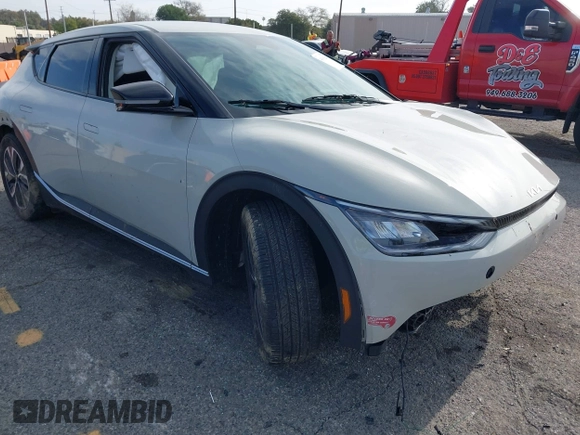 2024 Kia EV6 Wind with VIN KNDC34LA1R5214852, listed as a IAAI auction lot 41818262 with 14,950 mi miles and . Bid and sale history available at DreamBid. Image 1.