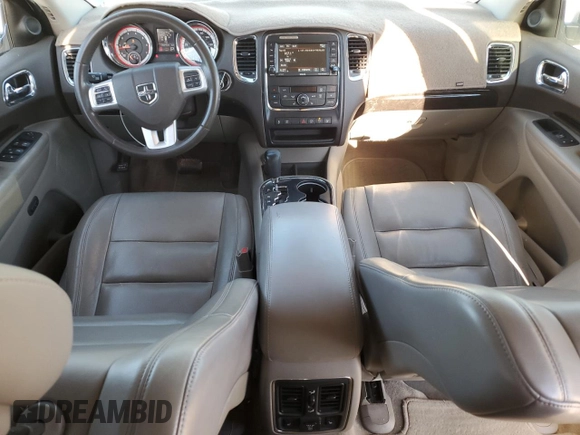2013 Dodge Durango Crew with VIN 1C4SDHDT0DC590172, listed as a Copart auction lot 80140034 with 135,078 mi miles and Salvage title. Bid and sale history available at DreamBid. Image 8.