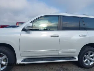 2015 Lexus GX 460 with VIN JTJBM7FX9F5094656, listed as a IAAI auction lot 42649277 with 156,967 mi miles and . Bid and sale history available at DreamBid. Image 14.