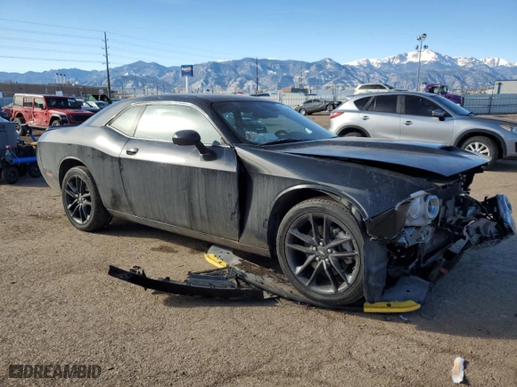 2021 Dodge Challenger GT with VIN 2C3CDZKG3MH677579, listed as a Copart auction lot 41977525 with 65,597 mi miles and Salvage Title. Bid and sale history available at carsss.com. Image 4.