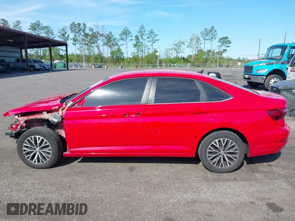 2021 Volkswagen Jetta S z VIN 3VWC57BU3MM016295, wystawiony jako IAAI lot #41880683 z przebiegiem 85 113 mil mil oraz . Historia ofert i sprzedaży dostępna na DreamBid. Obrazek 14.