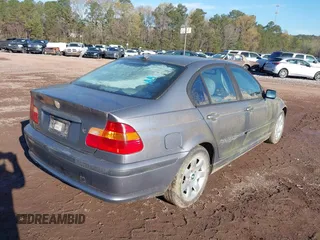 2004 BMW 3 Series 325i with VIN WBAEV33434KR33499, listed as a IAAI auction lot 41874981 with 216,828 mi miles. Bid and sale history available at carsss.com. Image 4.