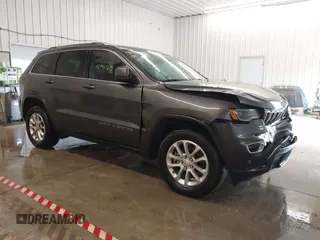 2021 Jeep Grand Cherokee Laredo X with VIN 1C4RJEAG4MC713856, listed as a IAAI auction lot 42446805 with 105,611 mi miles and . Bid and sale history available at DreamBid. Image 1.