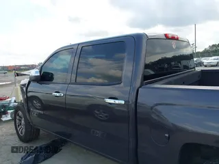 2014 Chevrolet Silverado 1500 LT with VIN 3GCPCREC7EG135069, listed as a IAAI auction lot 41999001 with 208,720 mi miles and . Bid and sale history available at DreamBid. Image 14.
