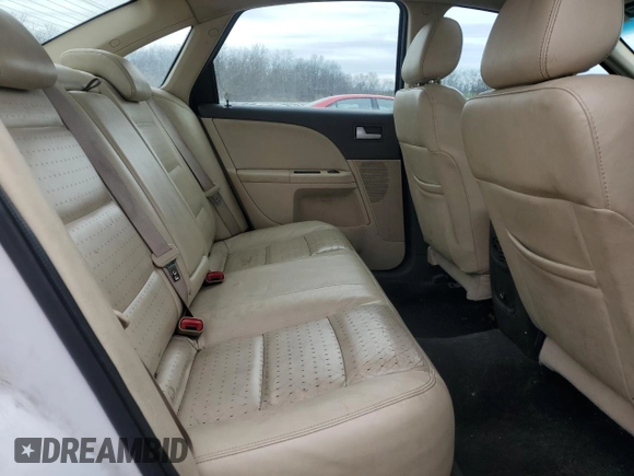 2008 Mercury Sable Premier z VIN 1MEHM42WX8G625135, wystawiony jako Copart lot #52001865 z przebiegiem 182 725 mil mil oraz Szkody całkowita. Historia ofert i sprzedaży dostępna na DreamBid. Obrazek 10.