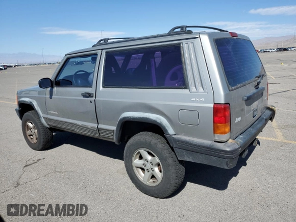 2000 Jeep Cherokee SE with VIN 1J4FF27SXYL140055, listed as a Copart auction lot 70315454 with 176,017 mi miles and Salvage title. Bid and sale history available at DreamBid. Image 2.