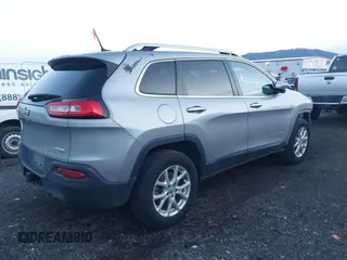 2014 Jeep Cherokee Latitude with VIN 1C4PJMCSXEW220556, listed as a IAAI auction lot 41060501 with 70,152 mi miles and . Bid and sale history available at carsss.com. Image 4.