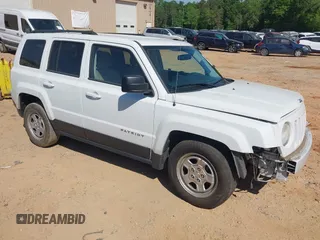 2014 Jeep Patriot Sport z VIN 1C4NJPBB2ED785423, wystawiony jako IAAI lot #42176791 z przebiegiem 117 208 mil mil oraz . Historia ofert i sprzedaży dostępna na DreamBid. Obrazek 1.