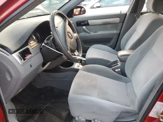 2004 Suzuki Forenza S z VIN KL5JD52Z94K061669, wystawiony jako Copart lot #81585854 z przebiegiem 80 186 mil mil oraz Szkody całkowita. Historia ofert i sprzedaży dostępna na DreamBid. Obrazek 7.