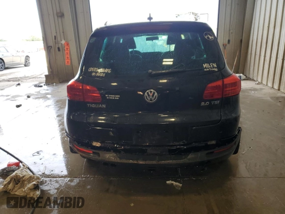2013 Volkswagen Tiguan S with VIN WVGAV3AX1DW602083, listed as a Copart auction lot 57977515 with 114,375 mi miles and Clean title. Bid and sale history available at DreamBid. Image 6.
